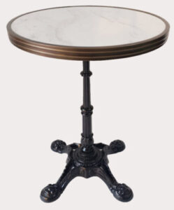 white marble table with large legs